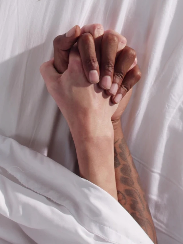 Reference couple holding hands